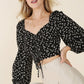 Ruched floral print crop top with puff sleeves