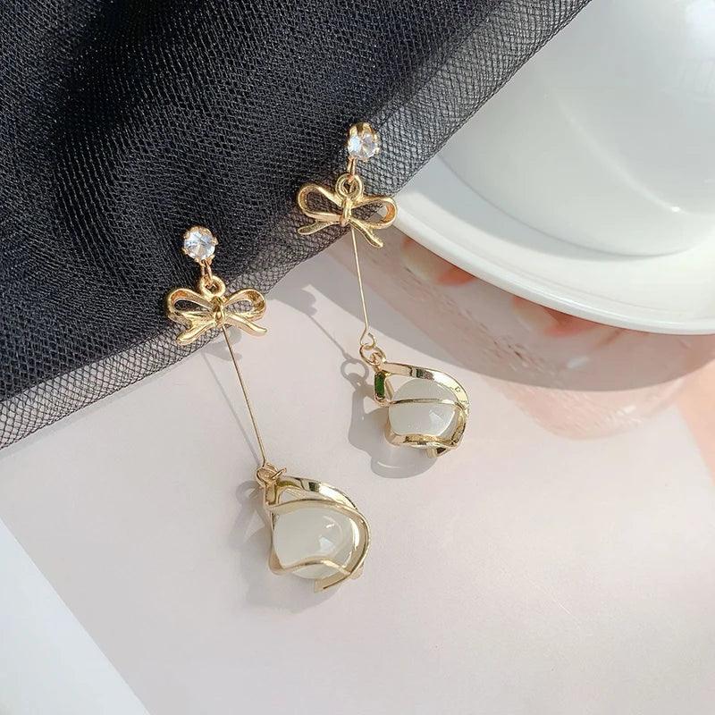 Trendy Metal Frame Dangle Opal Earrings for Women Golden Rhinestones Bow Knot Drop Earrings Wedding Party Long Jewelry Gift