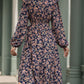 Perfee Printed Surplice Long Sleeve Midi Dress